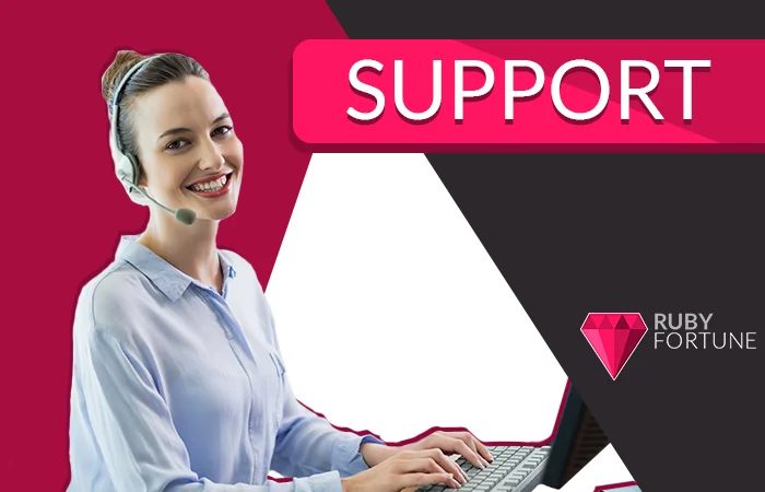 An image of a woman from Ruby Fortune's customer service team working at a computer.
